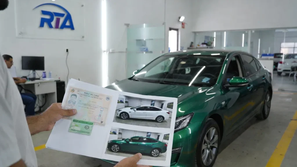 Customer holding RTA Mulkiya and before-after photos of green car after color change in Sharjah workshop